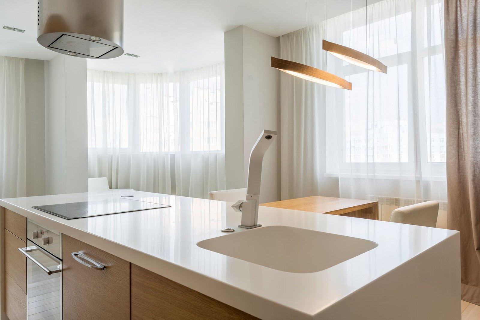 Bright, clean kitchen with a clear worktop and natural light